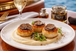 The Coast of Wealth: Onassis’s Scallops with Parsnip Puree & Black Summer Truffle